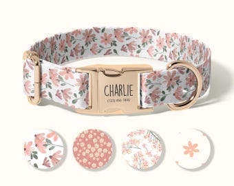 May include: A floral dog collar with a gold-colored buckle. The collar features a white background with pink flowers and green leaves. The buckle is engraved with the name "Charlie" and a phone number. Four circular design samples are shown below the collar.
