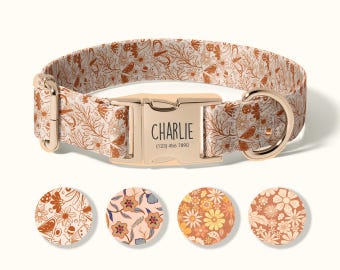May include: A beige dog collar with a floral and botanical pattern in brown. The collar has a gold-colored buckle with the name "Charlie" and a phone number. Four circular fabric samples with different floral designs are below the collar.