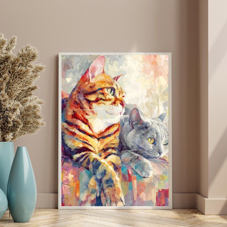 Puede incluir: Una impresi&oacute;n art&iacute;stica enmarcada con dos gatos. Uno tiene rayas naranjas y negras, el otro es gris. La obra de arte utiliza un estilo pict&oacute;rico colorido con pinceladas visibles. Los gatos descansan sobre una superficie estampada.