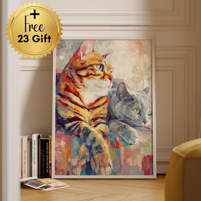 Puede incluir: Una impresi&oacute;n art&iacute;stica enmarcada con dos gatos. Uno tiene rayas naranjas y negras, el otro es gris. La obra de arte tiene un estilo impresionista colorido. Un sello dorado con el texto "+ Free 23 Gift" est&aacute; en la esquina superior izquierda.