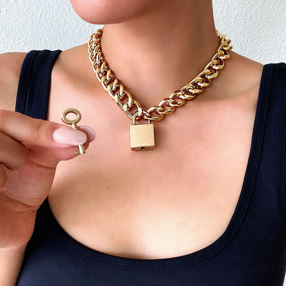 Repurposed vintage brass Louis Vuitton padlock 311 with layered style  necklace chains