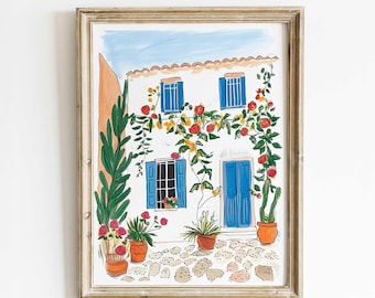 Puede incluir: Pintura a la acuarela de un edificio blanco con contraventanas y puerta azules, adornado con rosas trepadoras. Plantas en macetas y un camino de piedra se suman a la escena mediterránea. La obra está enmarcada.