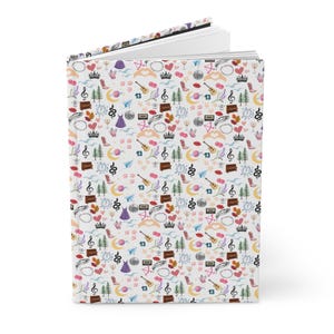 swifty lined hardcover journal with eras icons for taylor fan gift