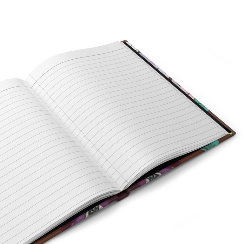 lined hardcover journal inside with surprise piano flowers on the outside for swifty fans