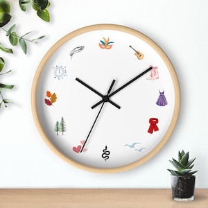 round eras wall clock with symbols from all swifty eras
