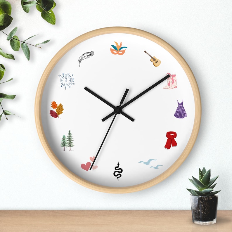 round eras wall clock with symbols from all swifty eras