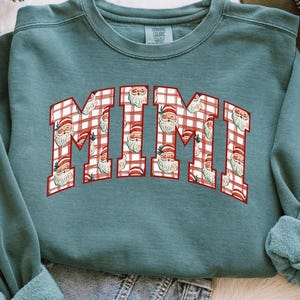 Sudadera navideña vintage de Santa Mimi, suéter navideño de cuello redondo con cuadros rojos de colores cómodos, regalo navideño para revelar el embarazo.