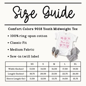 May include: A white youth t-shirt with a pink floral design and the text "Flower Girl." The image includes a size guide with measurements in inches for XS to XL sizes. The shirt is Comfort Colors 9018, made of ring-spun cotton.
