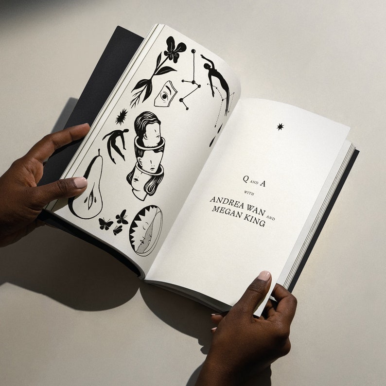 May include: An open book with black and white illustrations on the left page. The right page has the text "Q and A with Andrea Wan and Megan King".