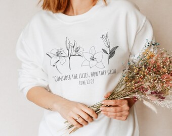 Betrachten Sie das Lilien-Sweatshirt, botanische christliche Rundhalsausschnitt, Luke 12 27 Bibel-Vers-Hemd, Blumen-Pullover, Damenbekleidung, Geschenk für sie,
