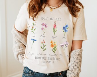 Könnte beinhalten: Ein beiges T-Shirt mit einem floralen Design und dem Text "FINALLY, WHATEVER IS True Noble Right Pure Lovely Admirable Excellent Praiseworthy THINK ABOUT SUCH THINGS." Philippians 4:8