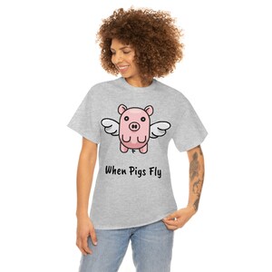 Unisex When Pigs fly cotton T-shirt super comfy and soft.