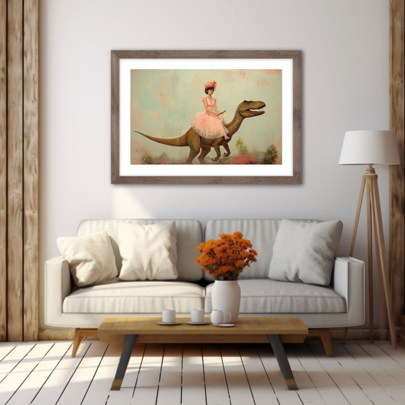 May include: A framed illustration of a woman in a pink dress riding a green dinosaur. The woman is wearing a pink flower in her hair and holding a book. The background is a light blue sky with clouds.