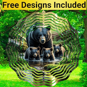 May include: A digital art print showing a black bear and three cubs in a stream, set in a green forest. The image is framed by a decorative green border and includes the text "10 Free Designs Included" in a yellow banner.