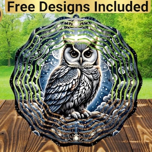 May include: A metal wind spinner with a detailed design of an owl in a mandala-like pattern. The owl is white with black and blue markings. The background is a swirling blue and white pattern.