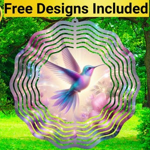May include: A metal wind spinner with a colorful hummingbird design. The hummingbird is surrounded by pink and purple flowers and a sparkling background. The wind spinner has a circular shape with multiple layers of metal.