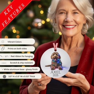 Lady holding ornament with key features listed on teh left side: vibrant colors, print on both sides, red ribbon for hanging, scratch and chip resistant, white aluminum base glossy finish.