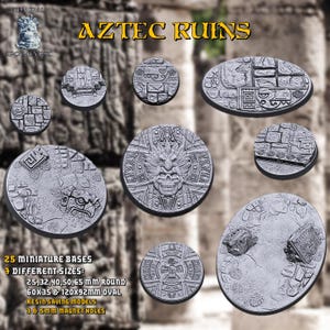 May include: 25 miniature bases in a variety of sizes, including round and oval shapes. The bases feature a grey stone design with intricate carvings and Aztec-inspired motifs. The text "AZTEC RUINS" is displayed at the top of the image.