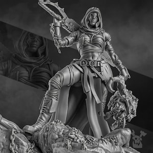May include: A grayscale figurine of a warrior figure, clad in layered armor and a hooded cloak. The figure is holding a chainsaw-like weapon and a grotesque head. The warrior is standing on a rocky base.