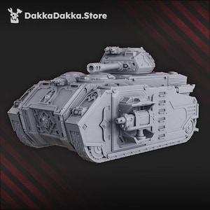 May include: A grey model tank with a large turret and detailed components. The tank has a boxy design with tracks and is set against a dark background. The text "DakkaDakka.Store" is in the upper left corner.