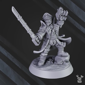 May include: A grey plastic miniature figurine of a military officer wearing a long coat, a hat with a skull emblem, and holding a pistol and a sword. The figurine is standing on a round base.