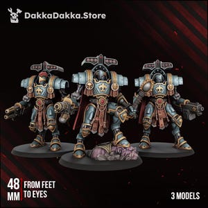 May include: Three miniature warrior figures in blue and gold armour with red capes, featuring fleur-de-lis emblems, skull motifs, and heavy weaponry. The text DakkaDakka.Store, 48 MM FROM FEET TO EYES, and 3 MODELS is visible on the image.