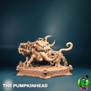 May include: A detailed sculpture of a monstrous creature with a pumpkin-like head, sharp teeth, and a long tongue. The sculpture is tan-colored and sits on a rectangular base. The text "THE PUMPKINHEAD" is at the bottom.