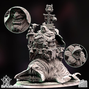 May include: A detailed, grey miniature sculpture of a monstrous creature with multiple figures and elements. The sculpture features a large, toothy maw, a seated figure, and various decorative elements like bells and banners. The base of the sculpture has the text "Sin's Miniatures".