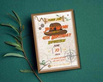 May include: A brown and tan invitation card with a compass, a snake, and a hat. The text on the card reads "Please Join Jack Wynn on his 4th Birthday Expedition, June 10, 2024, 4 PM, 123 Adventure Road, Any City, 12345, RSVP to Liz 555-555-5555".