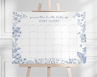 May include: A white calendar with a blue floral border. The calendar is titled "Guess the birth date of Baby Avery".