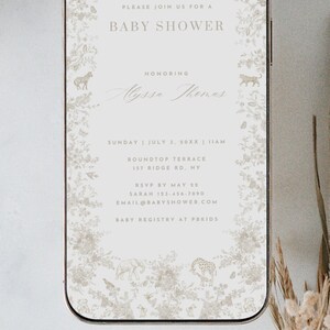 May include: A white and gray baby shower invitation with a floral design and a phone-shaped frame. The invitation includes the text "Please join us for a baby shower honoring Alyssa Thomas" and details about the event, including the date, time, location, RSVP information, and baby registry details.