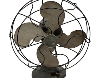 Ventilador oscilante vintage Emerson Electric 2450B de 10" con aspas metálicas, años 40.