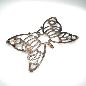 May include: A set of three ceramic mugs with a speckled, matte finish. The mugs are in shades of cream, light gray, and dark gray. Each mug has a simple, minimalist design, perfect for coffee or tea.