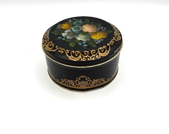 Contenitore da tè vintage retrò da collezione in metallo nero colorato con decorazioni floreali e filigrana dorata, prodotto in Inghilterra.
