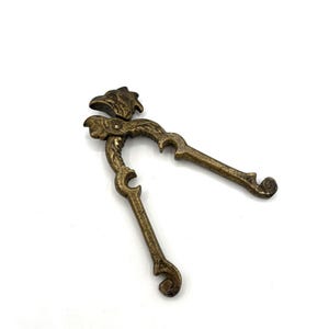 May include: A set of three ceramic mugs with a speckled, matte finish. The mugs are in shades of cream, light gray, and dark gray. Each mug has a simple, minimalist design, perfect for coffee or tea.