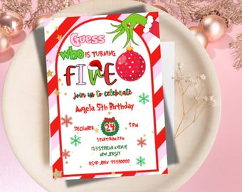 May include: A Christmas-themed birthday invitation for Angela's fifth birthday. The design features a Grinch theme with the text "Guess who is turning FIVE". The invitation includes a red and white striped border, snowflakes, and a Christmas ornament. The date is December 24th.