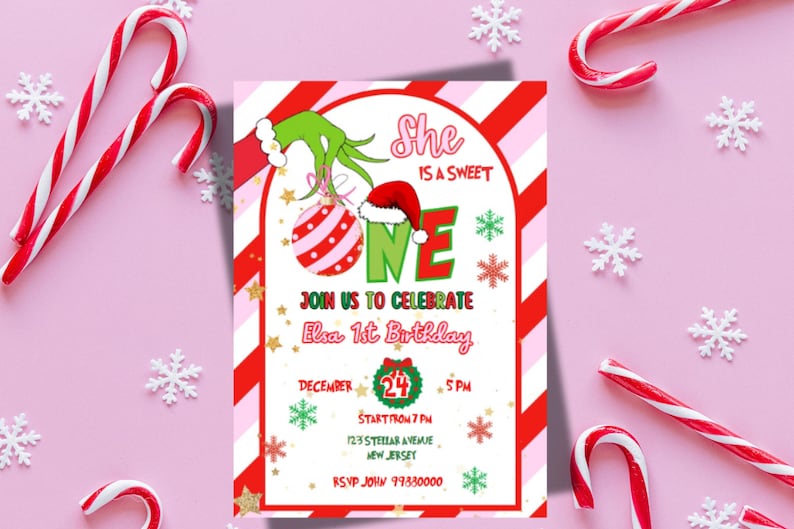 May include: A festive invitation for Elsa's 1st birthday, featuring a Grinch-themed design with a red and white striped ornament and Santa hat. The invitation includes the text "She is a sweet ONE" and event details.