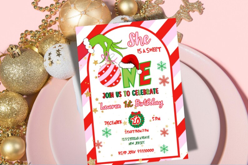 May include: A festive invitation for a first birthday celebration. The design features a Grinch-themed illustration with a red and white striped border. The text reads "She is a sweet ONE" and includes details for the party, such as the date, time, and location.