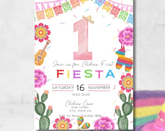 May include: A colorful invitation for a first birthday party with a fiesta theme. The invitation features a large pink number one, a guitar, a piñata, and cacti. The text on the invitation reads "Join us for Elidias First Fiesta, Saturday 16 November 10:00-12:00, Elidias Casa, 1234 Street, City, State Zip, RVP To Mom 123.456.7890".