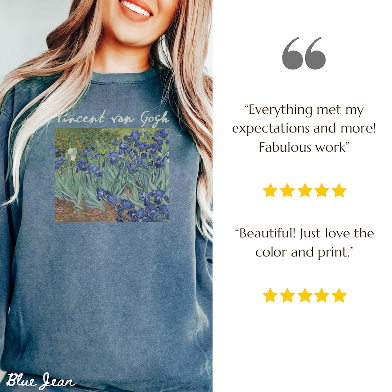 May include: A blue sweatshirt with a print of a painting by Vincent van Gogh. The painting depicts a field of irises in shades of blue, green, and yellow. The text "Vincent van Gogh" is printed above the painting.