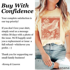 May include: A pale yellow t-shirt with a bird graphic and the words "RESPECT GOD'S CREATURES WHETHER GREAT OR SMALL". The shirt also displays the text "Buy With Confidence" and other text about customer satisfaction.