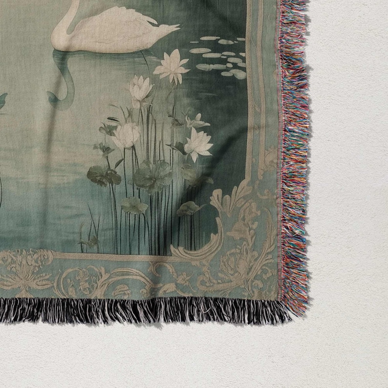 a tapestry with a swan and flowers on it