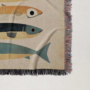 a blanket with a fish design on it