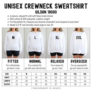 a women's crew neck sweatshirt with measurements