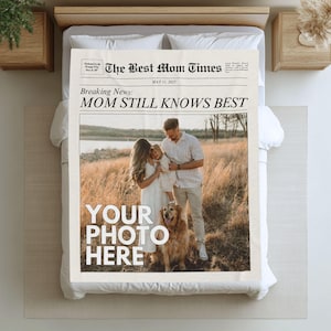 a photo of a couple and their dog on a pillow