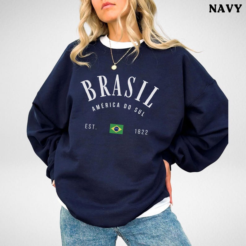 a woman wearing a sweatshirt with the words brasil on it