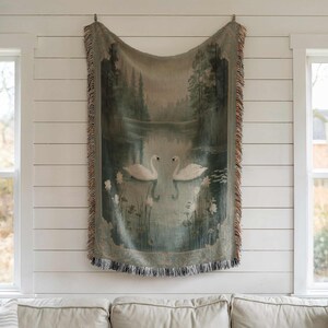 a tapestry hanging on the wall of a living room