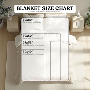 a bed with a white comforter and white sheets