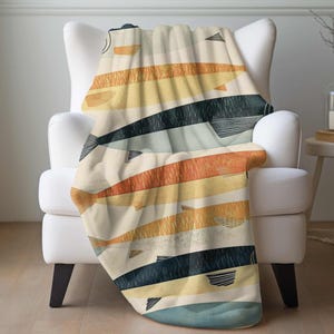 a chair with a blanket on top of it