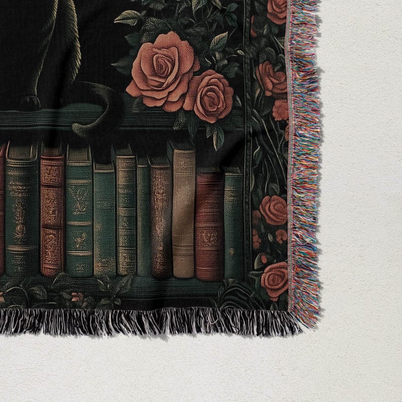 a tapestry of books and roses on a shelf